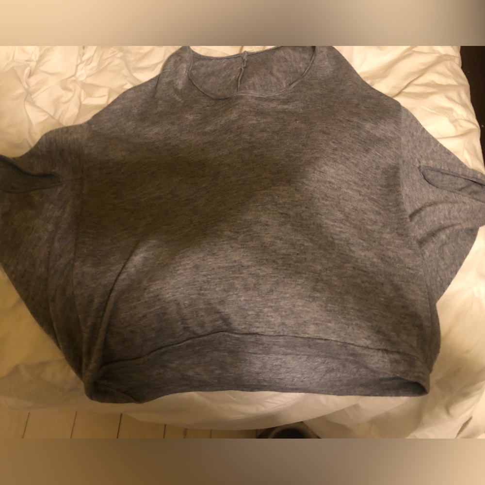 Gray Ya sweater.  Shorter top, cape sleeves